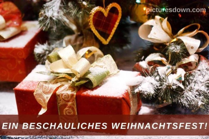 Frohe weihnachten bilder kostenlos ein Geschenk im Schnee herunterladen online